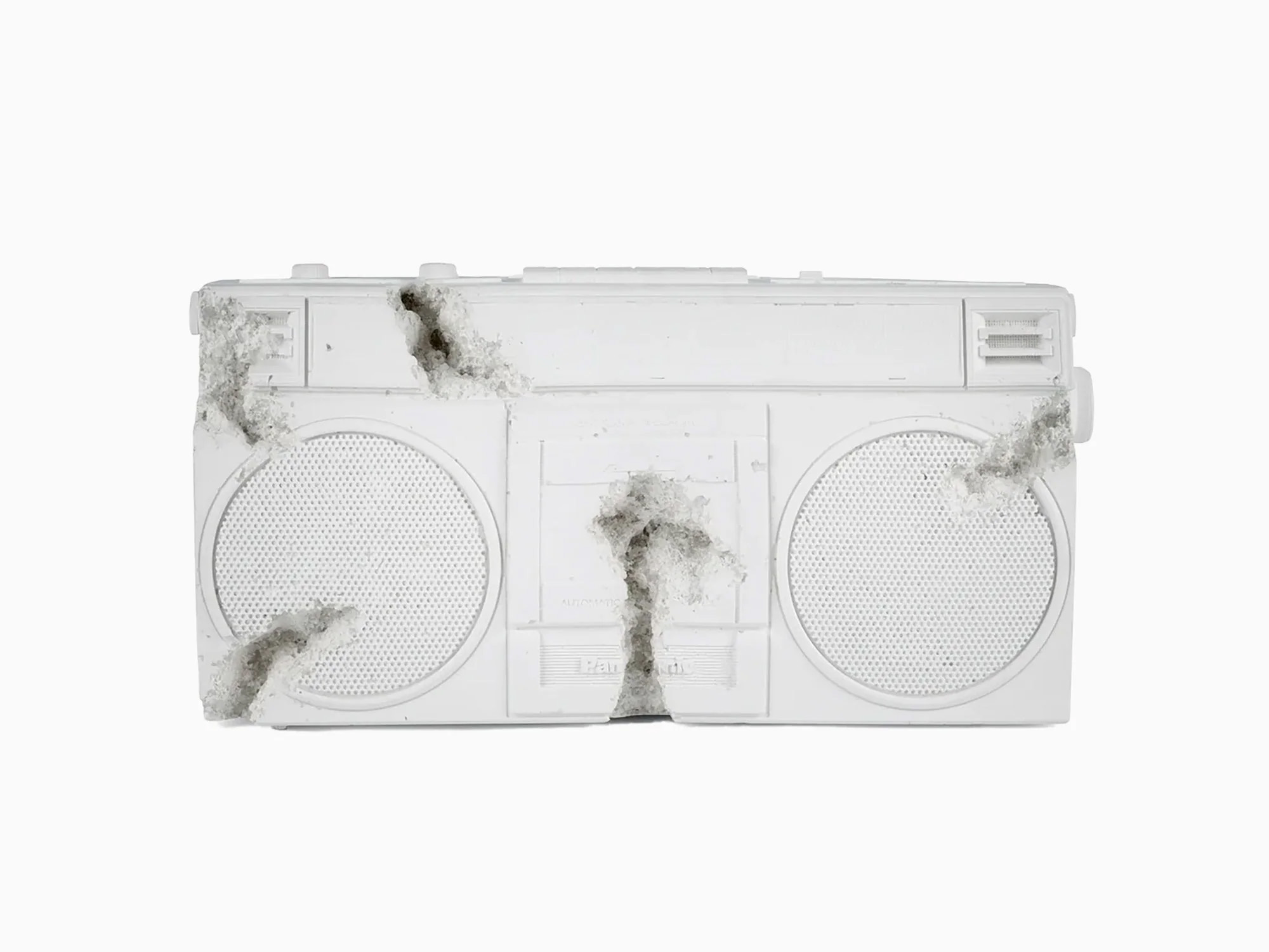 A white sculpture of a boom box.