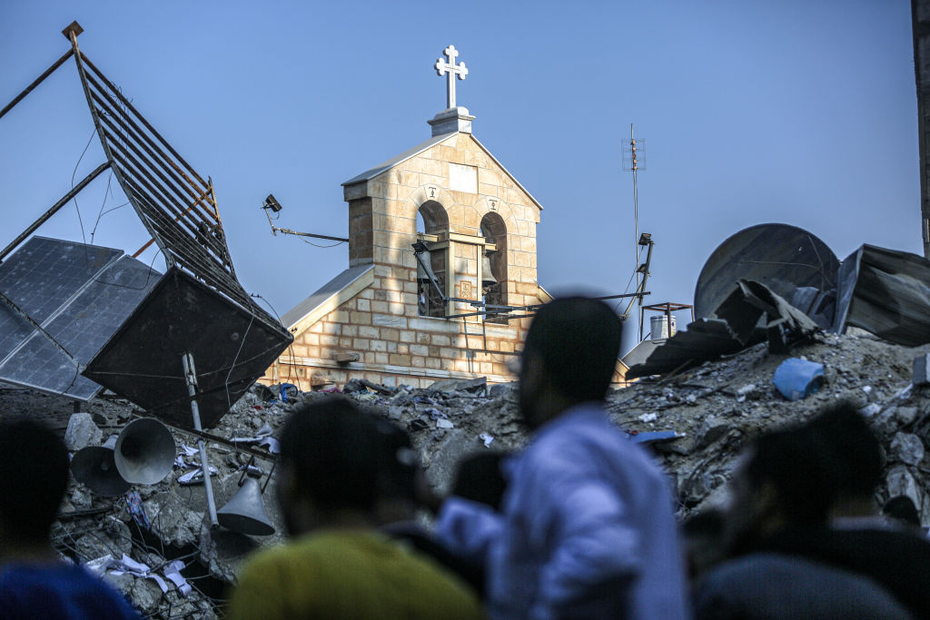 GAZA CITY, GAZA - OCTOBER 20: A view of the damaged historical Greek Orthodox Saint Porphyrius Church, where civilians took shelter, after Israeli airstrike in Gaza City, Gaza on October 20, 2023. At least eight people were killed in an overnight Israeli airstrike on the Greek Orthodox Saint Porphyrius Church in Gaza city, which was sheltering hundreds of Palestinians, local media reported on Friday. Civil defense teams and residents continue search and rescue efforts in the church. (Photo by Ali Jadallah/Anadolu via Getty Images)